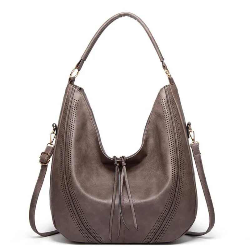 Minerva’s Classic Versatility | Vintage Leather Bag